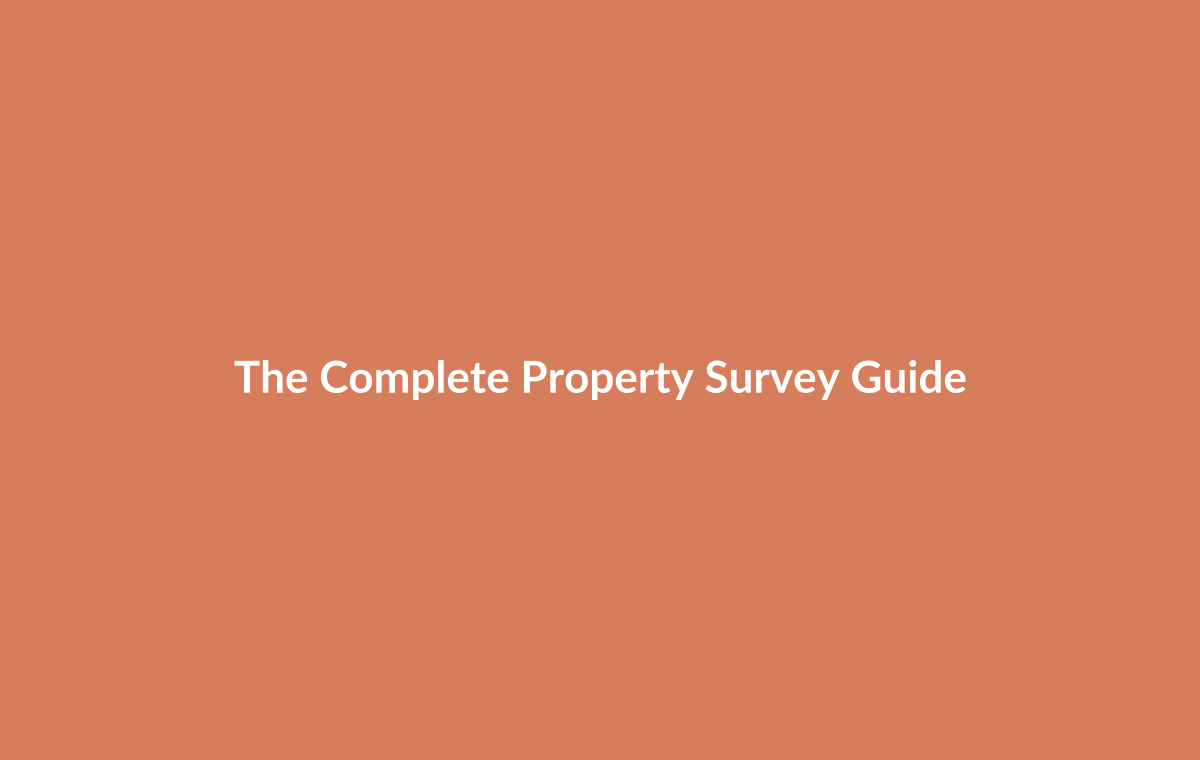 Property surveyor with clipboard inspecting house